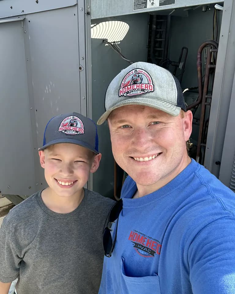Ben Randall with his son at a HomeHero HVAC jobsite
