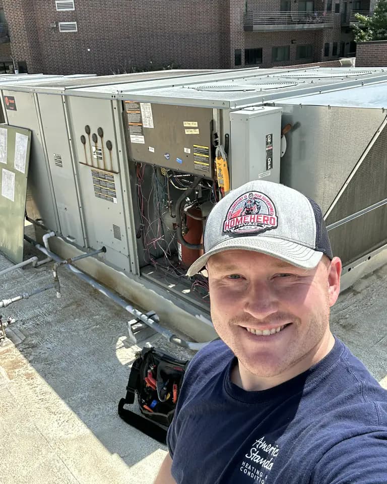 Ben Randall servicing a commercial rooftop HVAC system